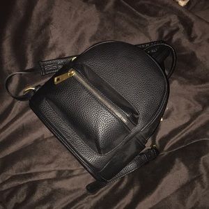 Brand new black mink backpack